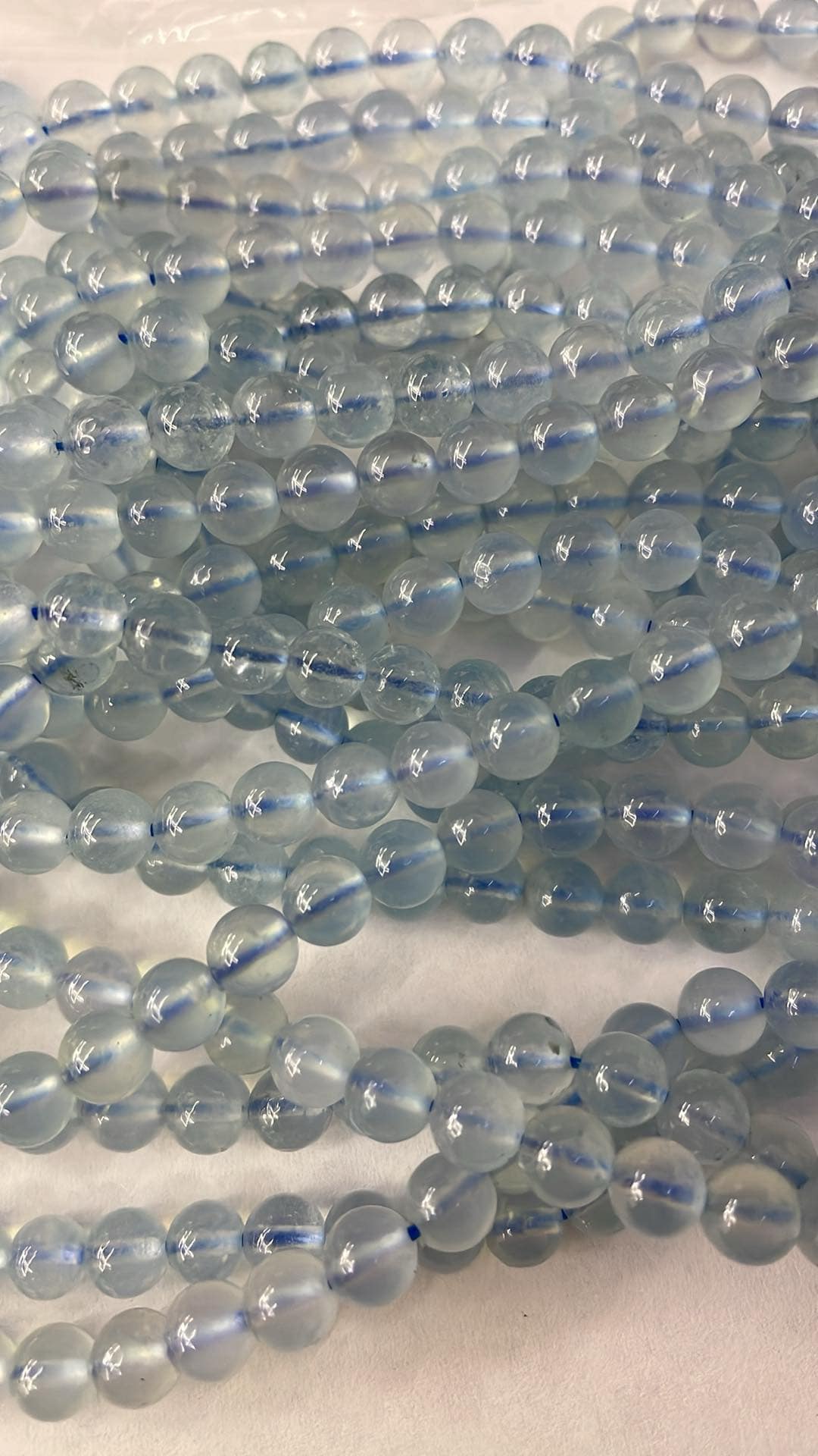 Fil de perles d'aigue-marine 6 mm transparent