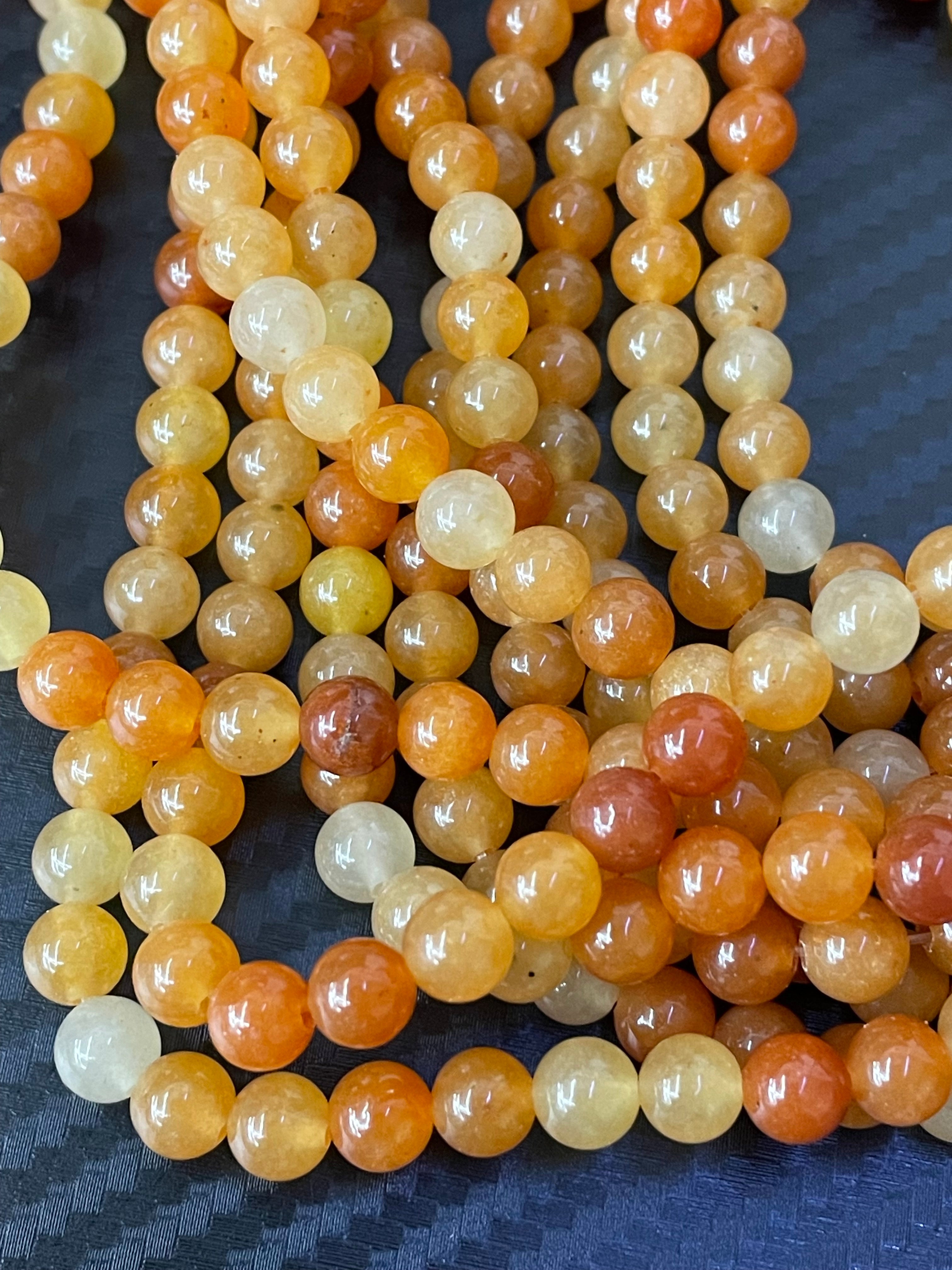 Fil de perles d'aventurine orange 6 mm