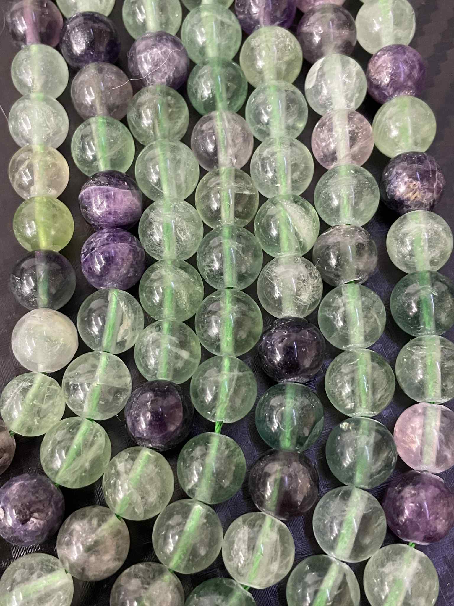 Fil de perles en fluorite env. 10 mm – qualité standard