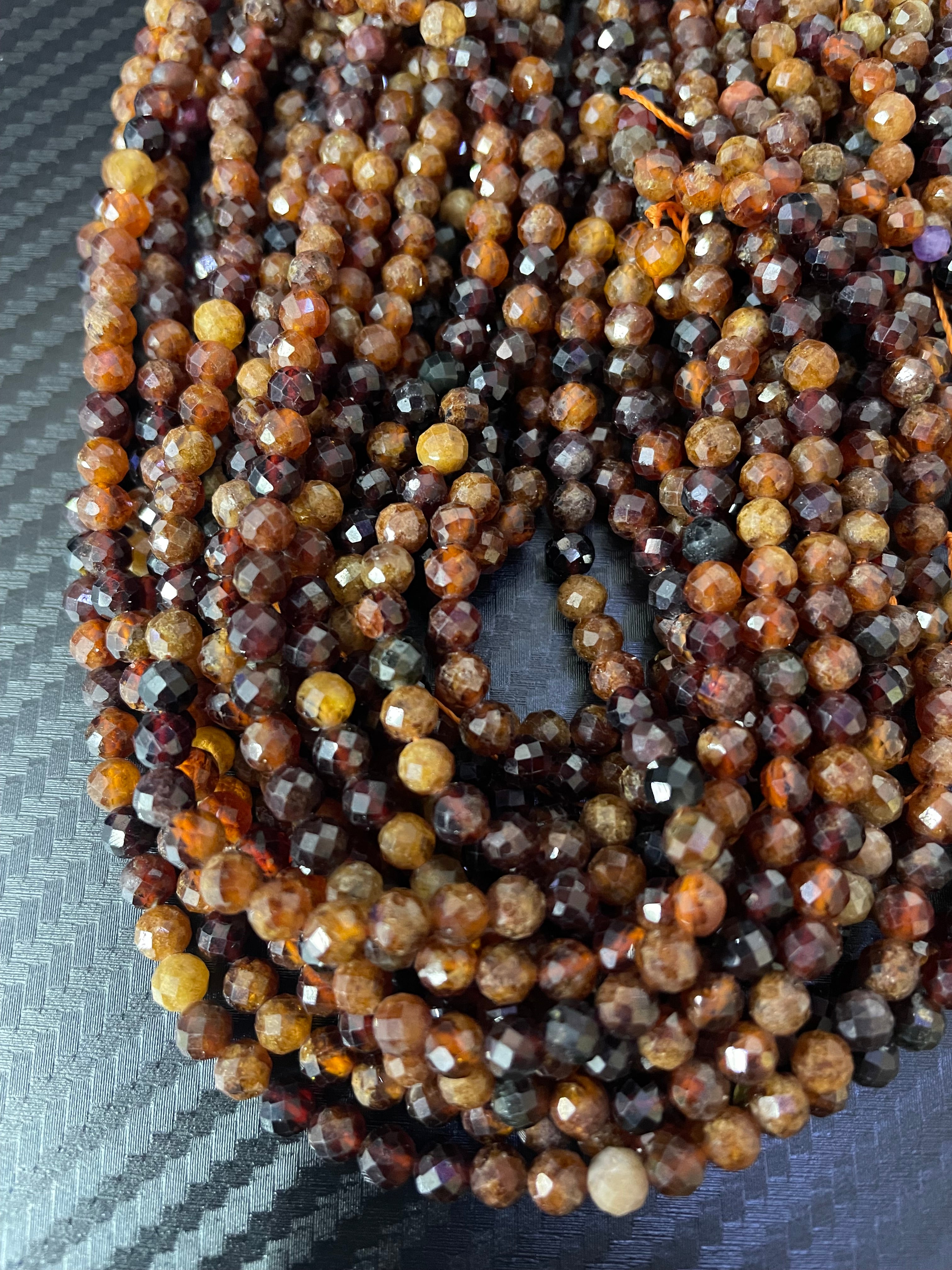 Granat Orange / Rot ca. 3.8mm facettiert rund