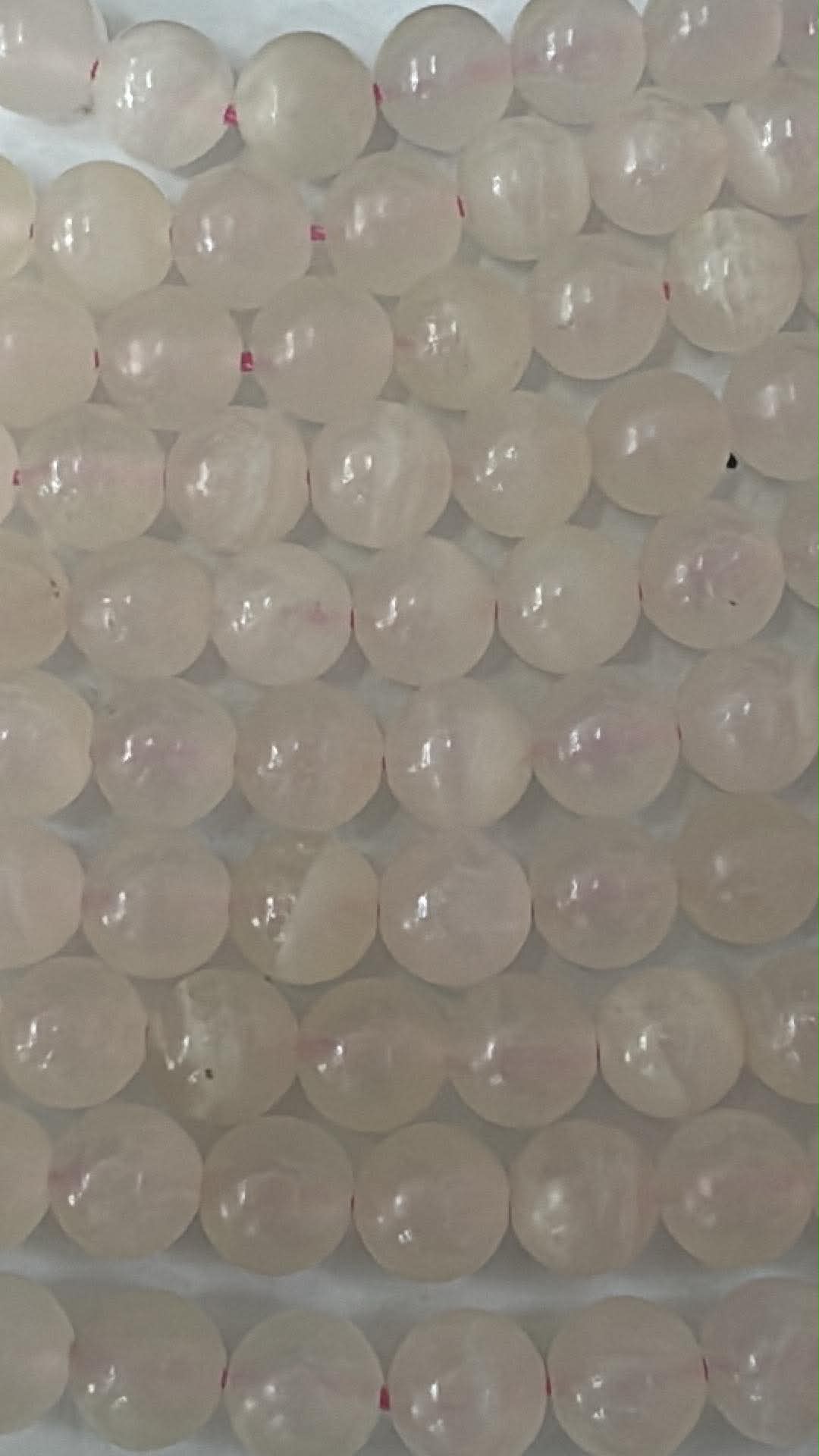 Calcite mangano, fil de perles rondes d’env. 8 mm