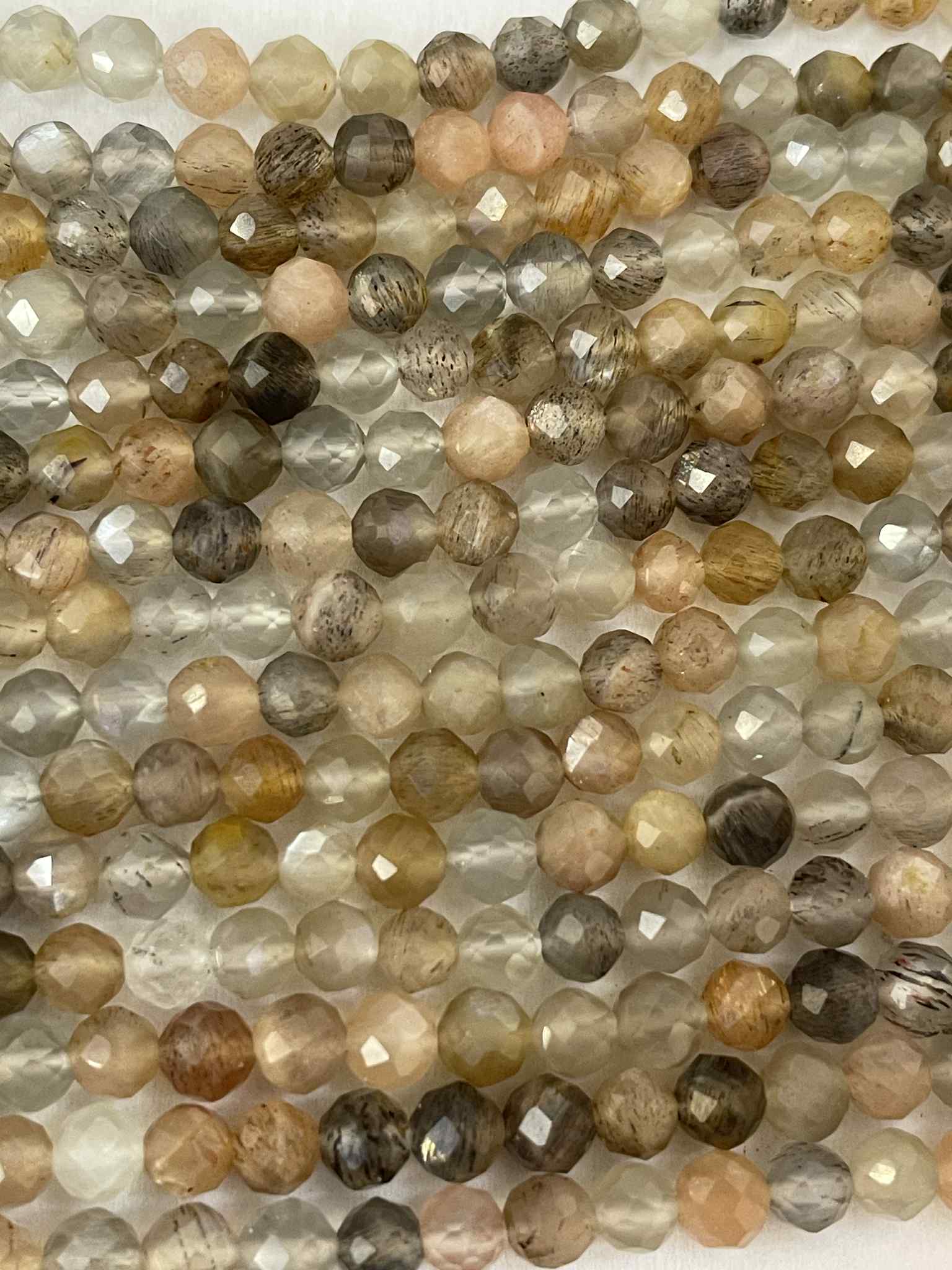 Mondstein 4mm facettiert grau - braun