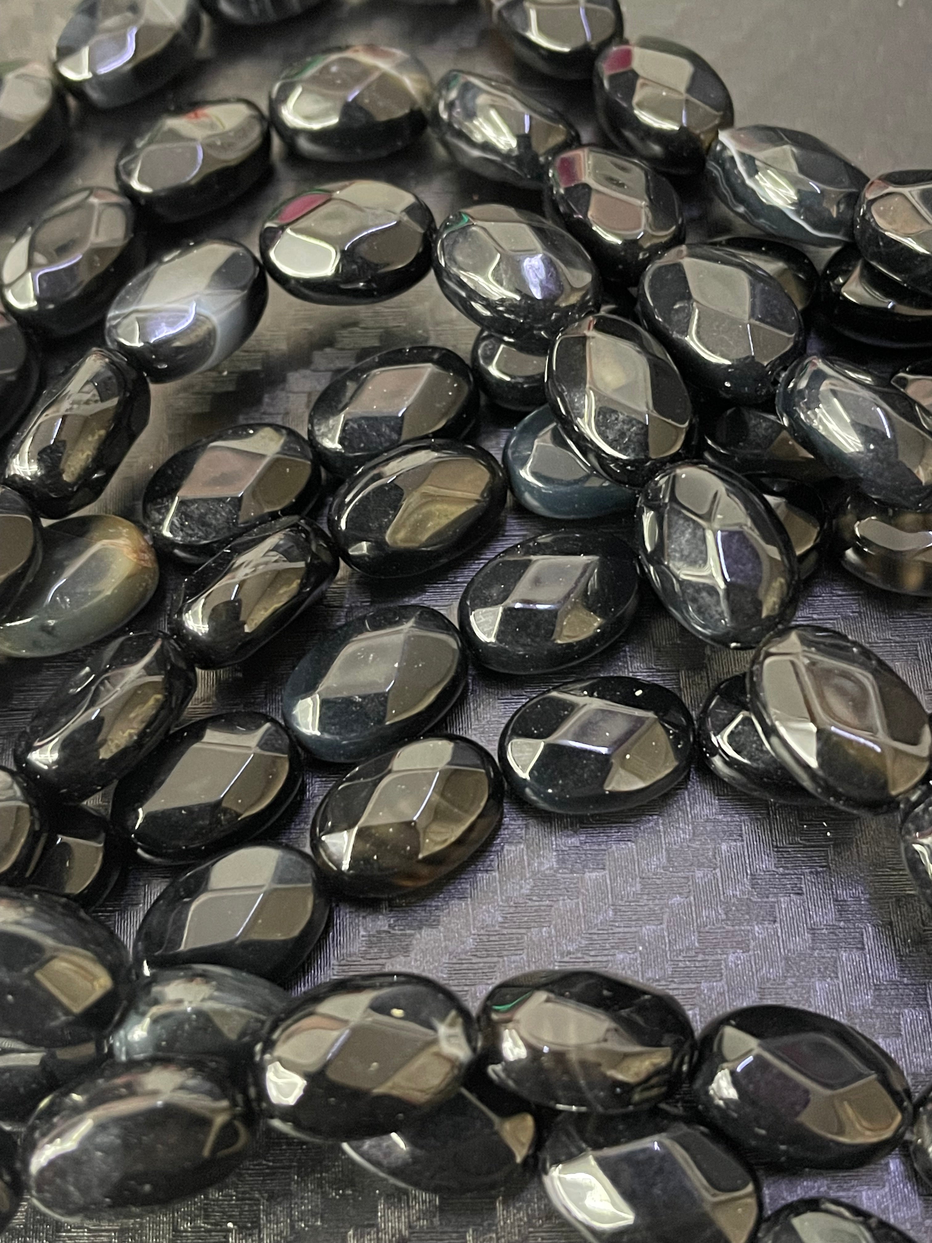 Onyx facettiert flach ca. 8 x 12mm
