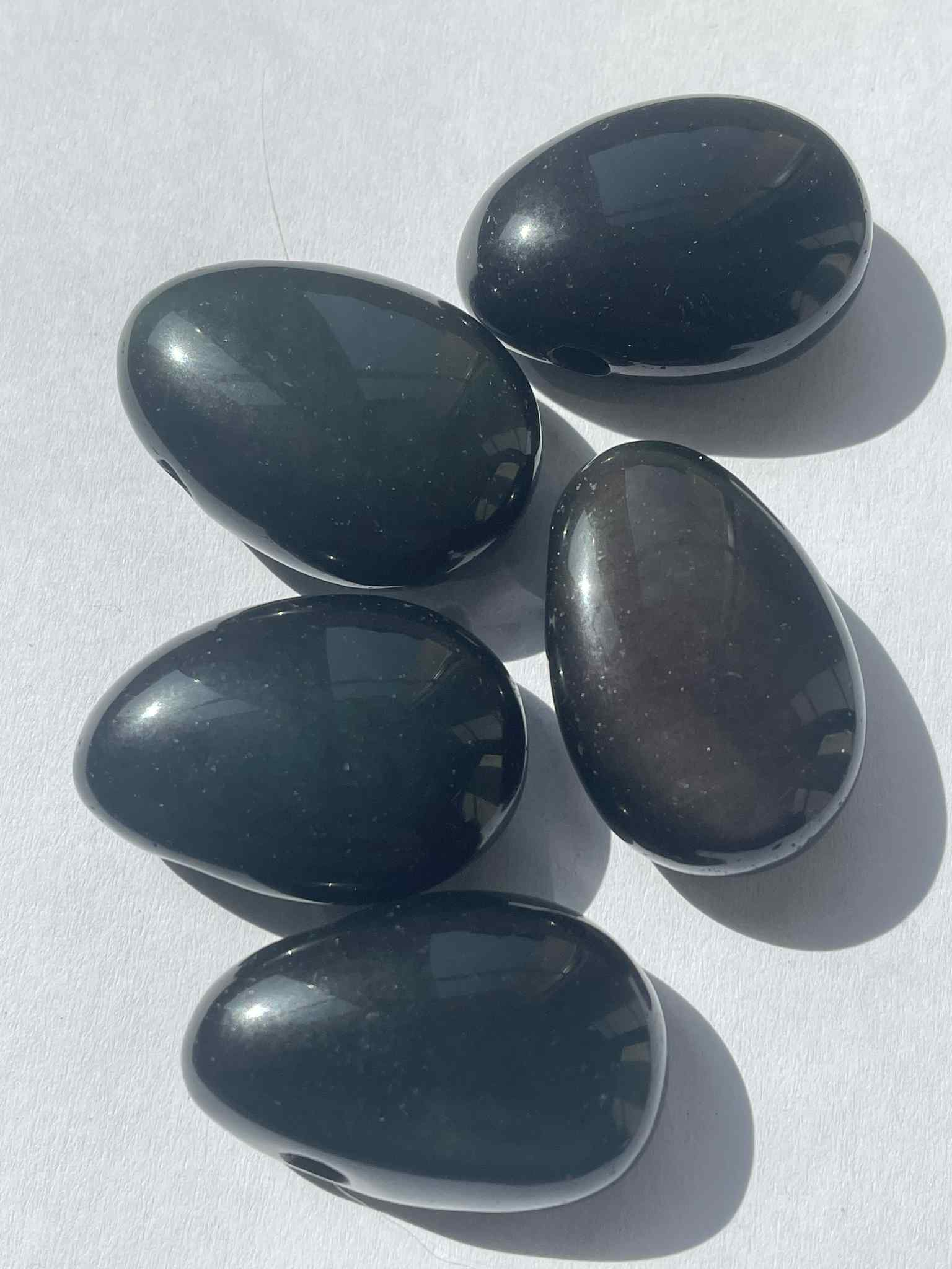 Regenbogen Obsidian Trommelstein gelocht