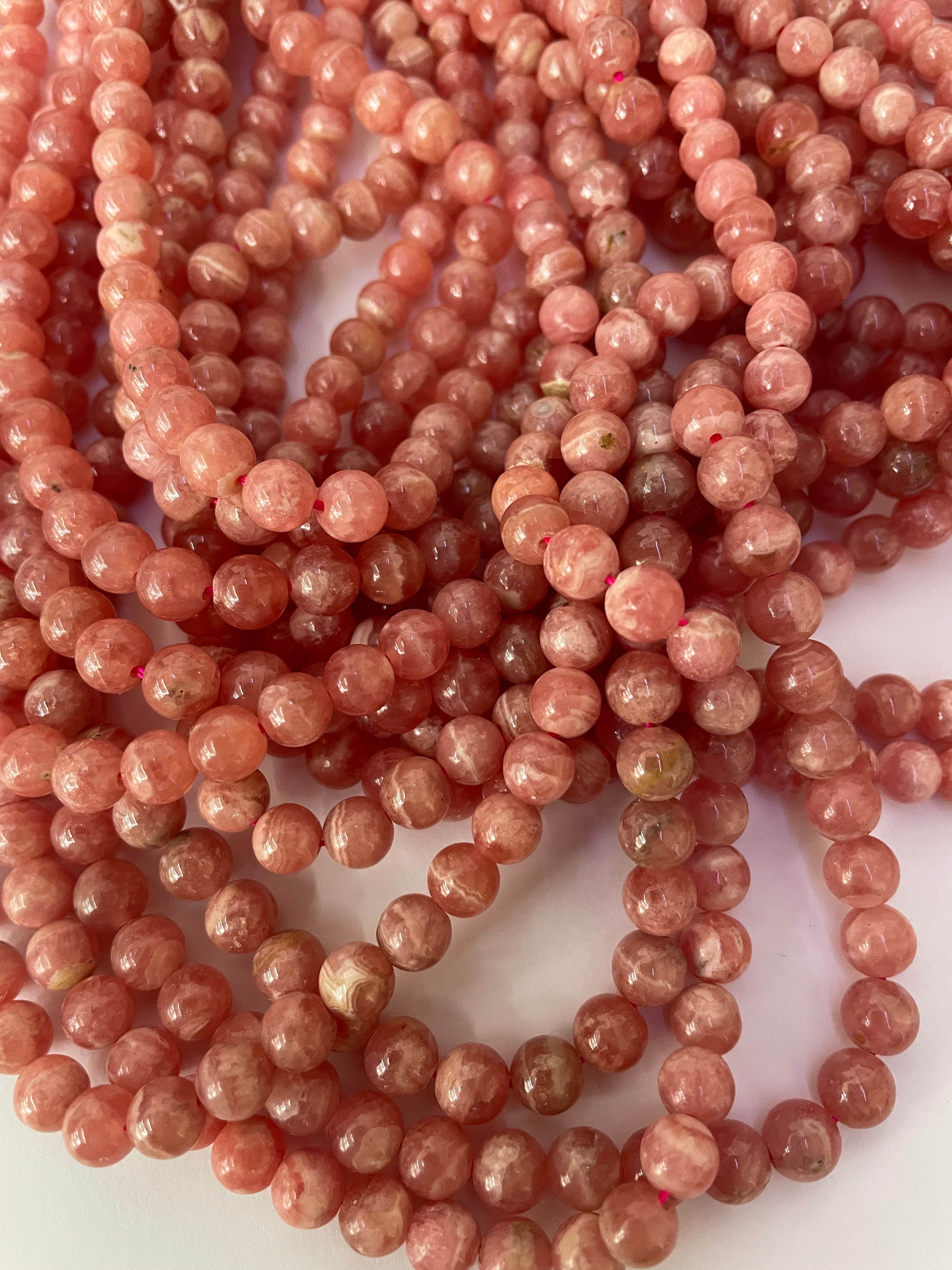 Fil de perles de rhodochrosite de 6 mm