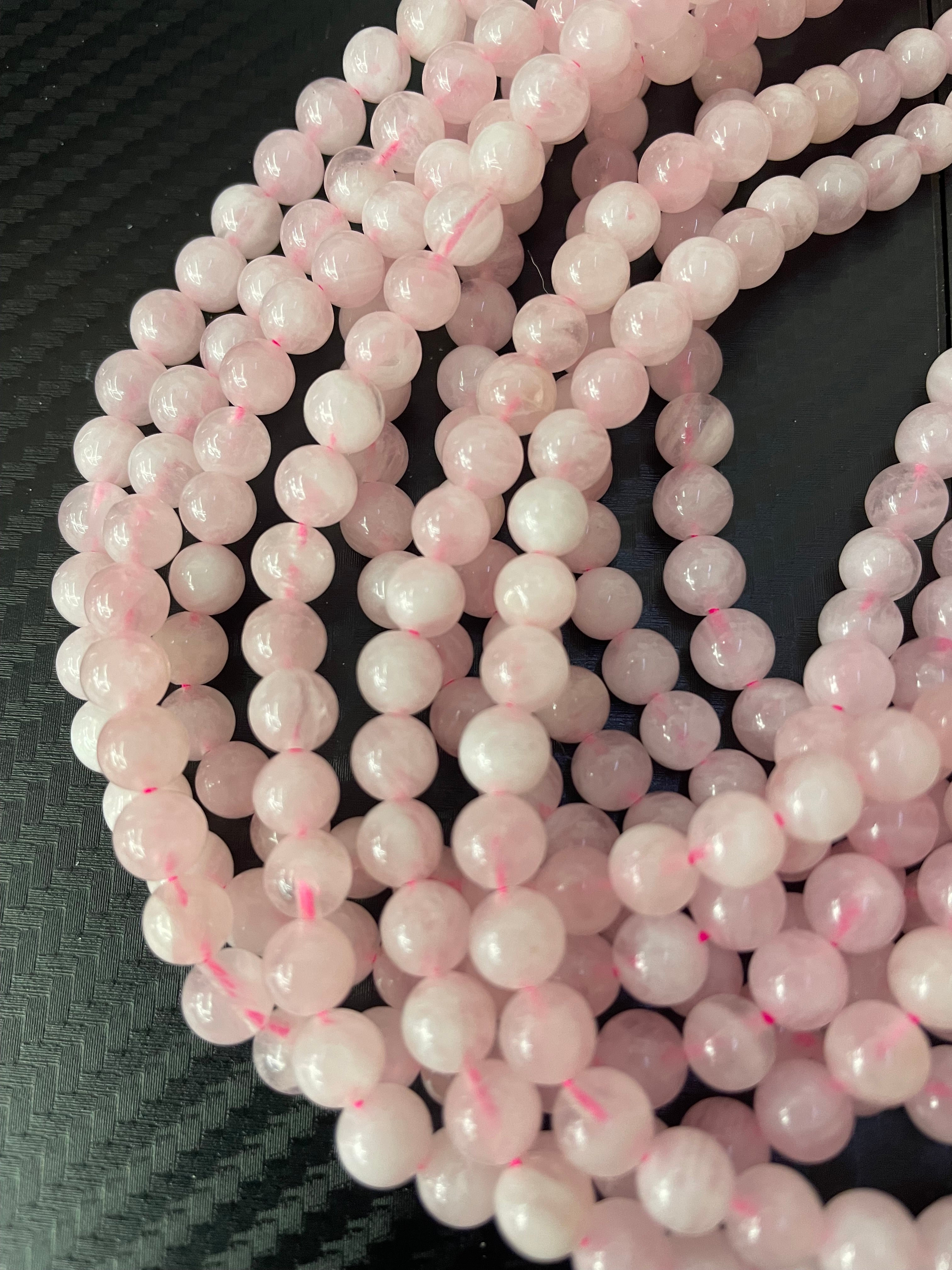 Fil de perles de quartz rose du Brésil de 6 mm (traité)