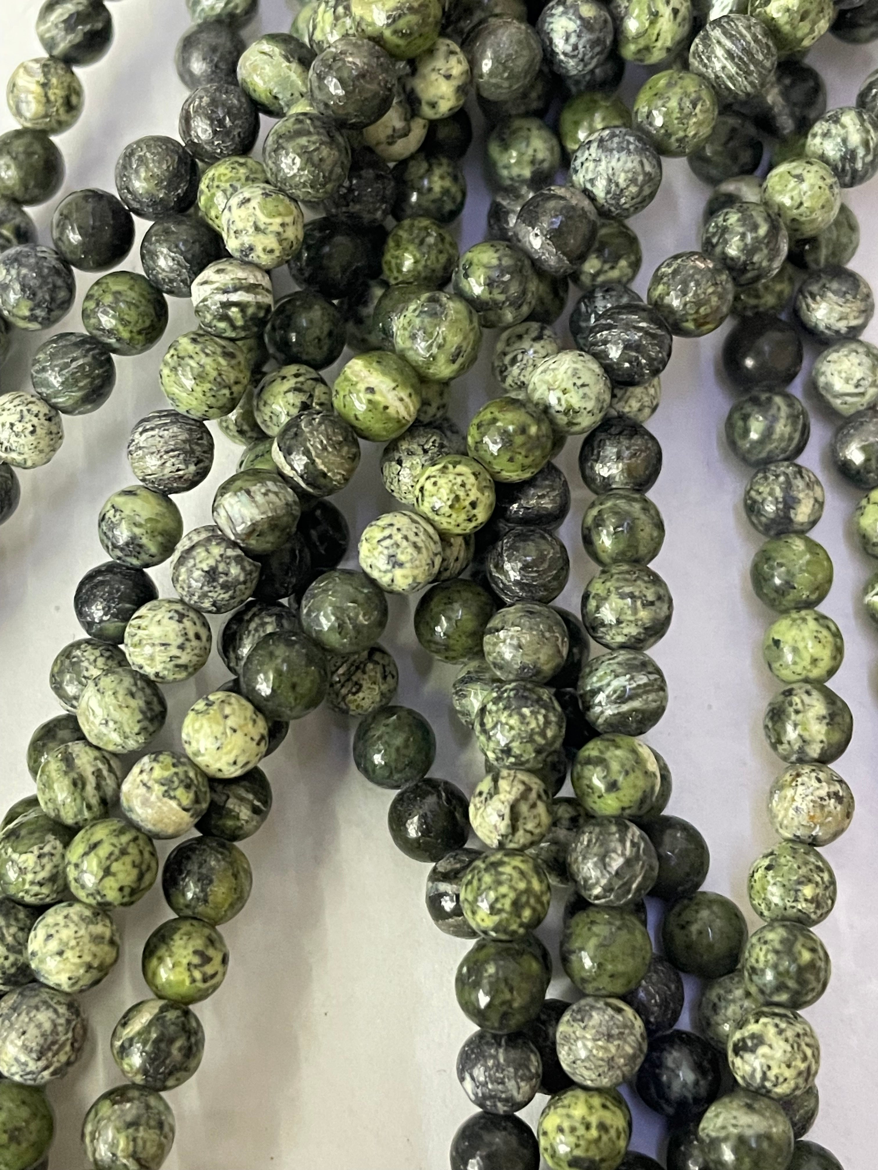 Fil de perles œil d'argent 4 mm