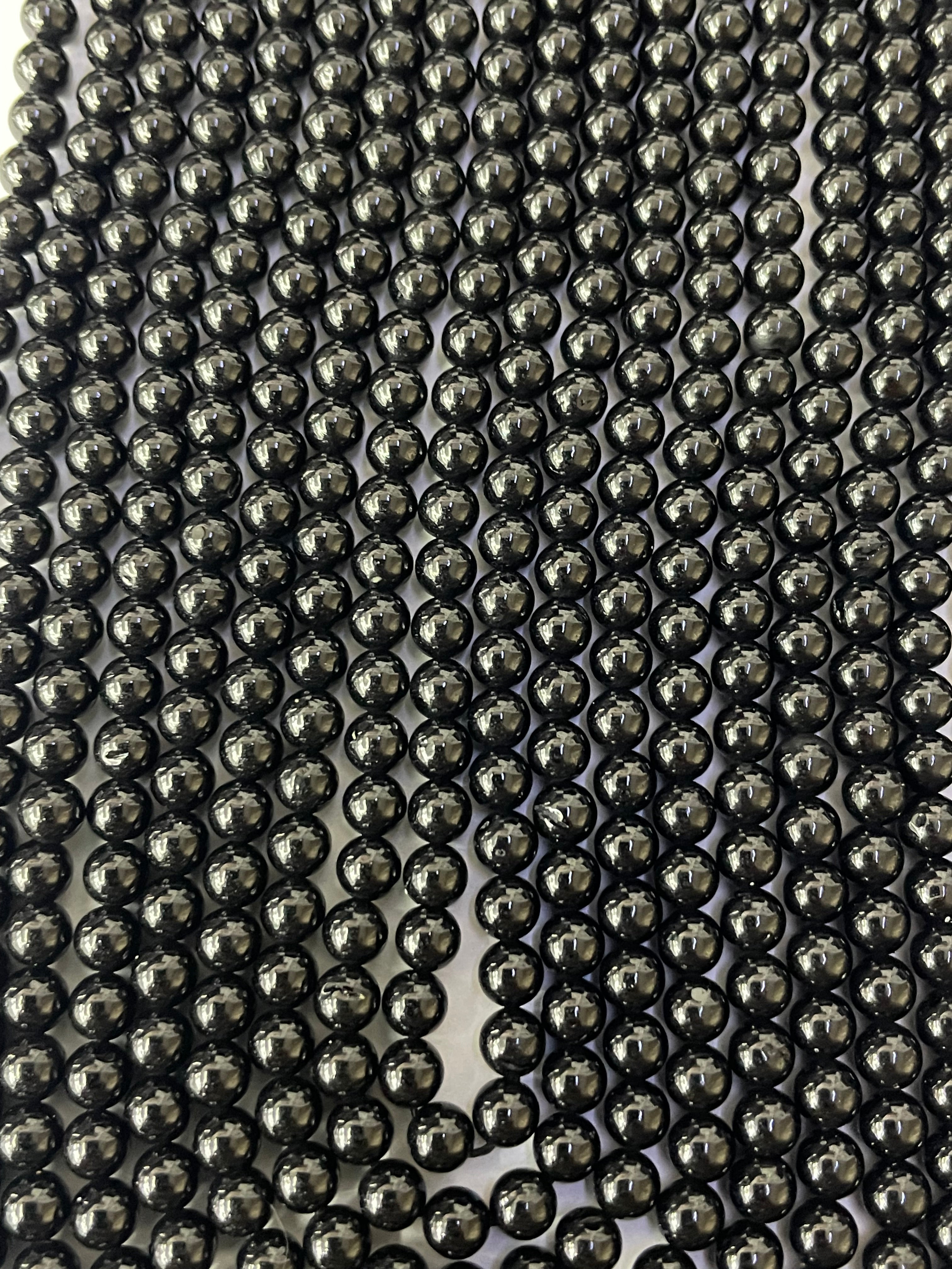 Fil de perles noires Spinelle 4 mm