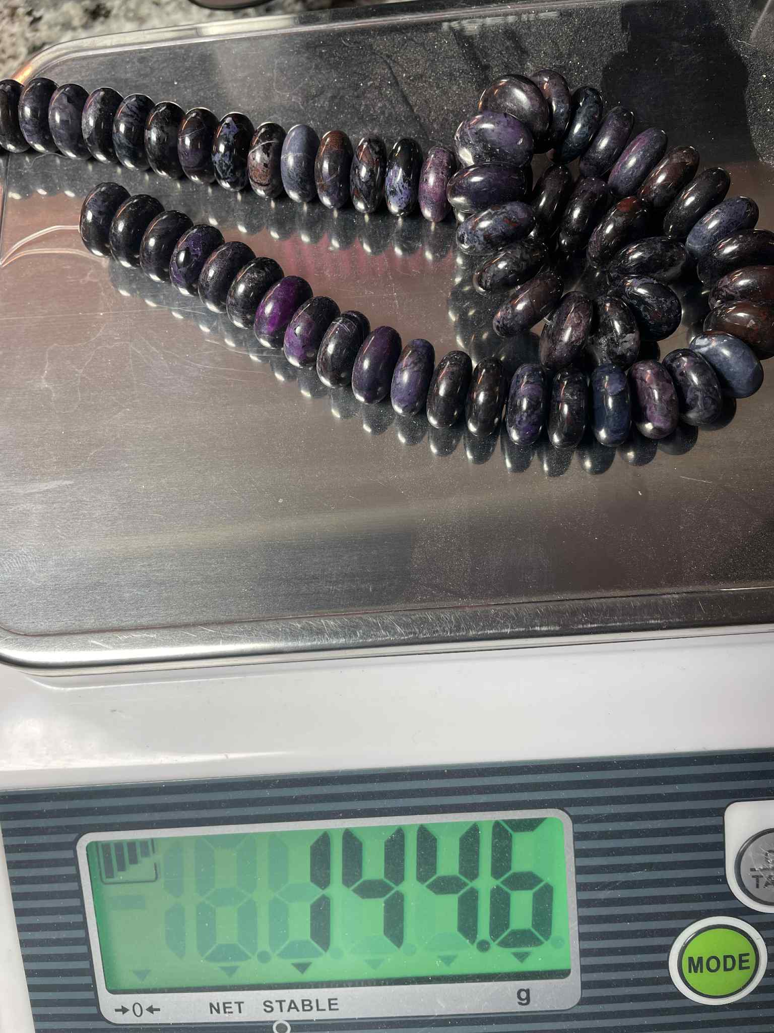 Rang de rondelles de sugilite 12 mm