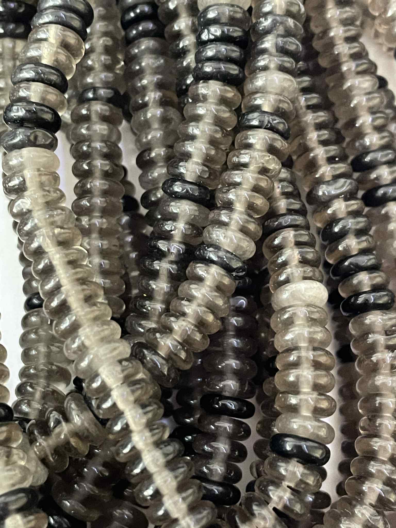 Fil de perles en obsidienne "larme d’Apache" env. 6 mm – rondelles – qualité naturelle