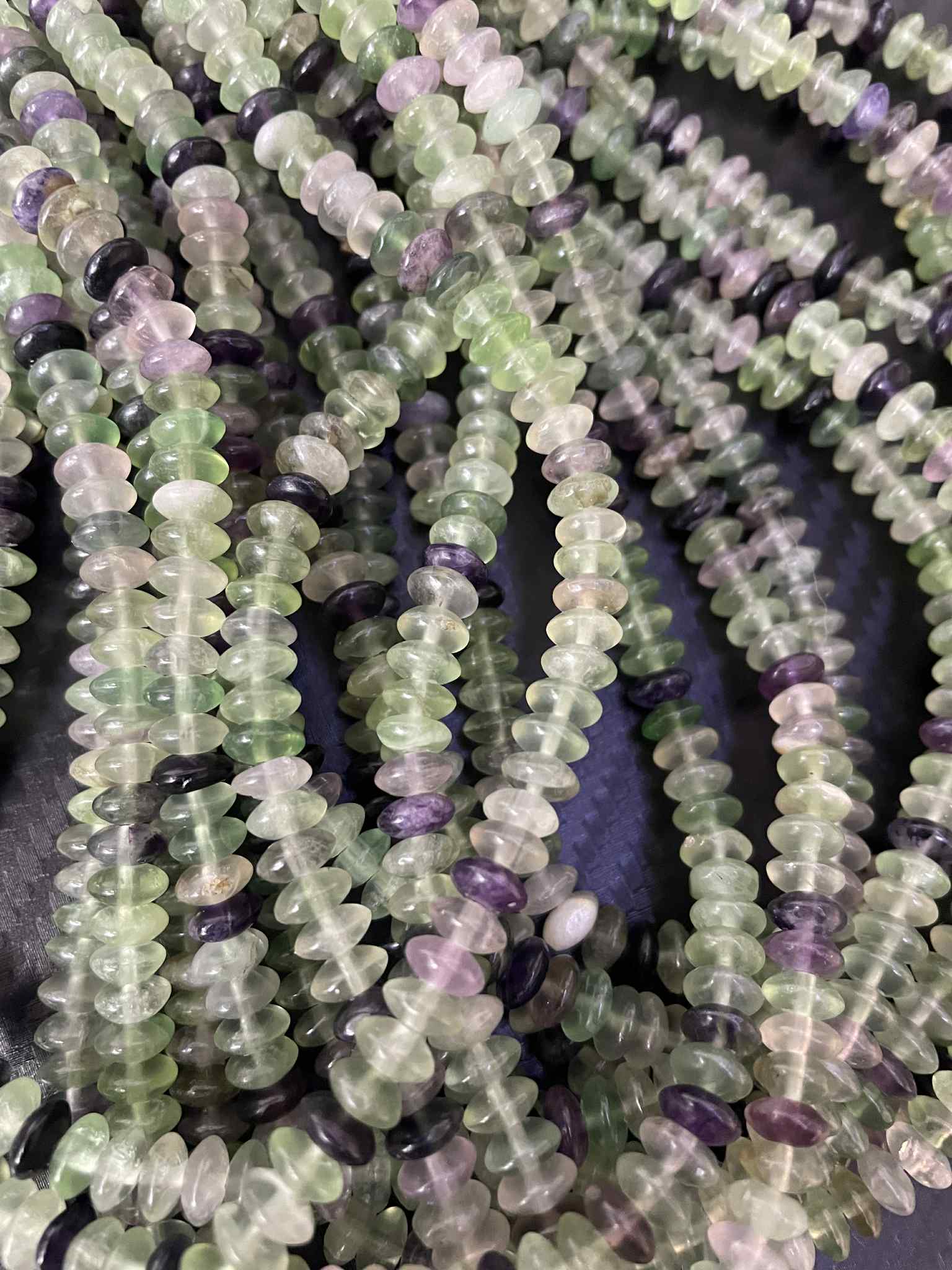 Fil de perles en fluorite – rondelles lisses env. 6 mm