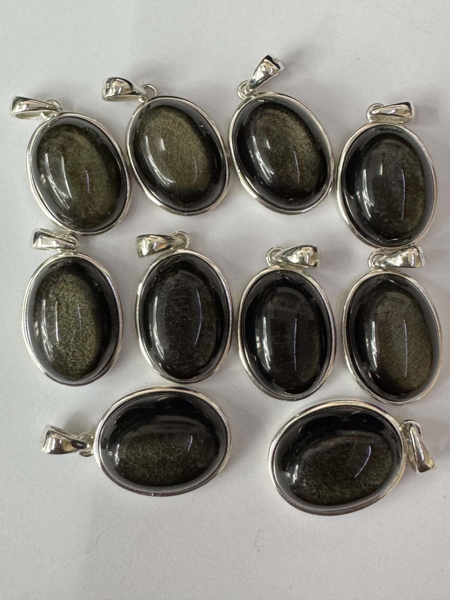 Pendentif en obsidienne dorée, monture en argent 925, avec poinçon de responsabilité suisse AMBRA