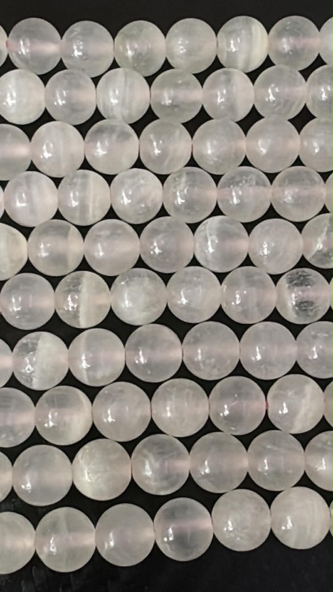 Calcite mangano, fil de perles rondes d’env. 8 mm