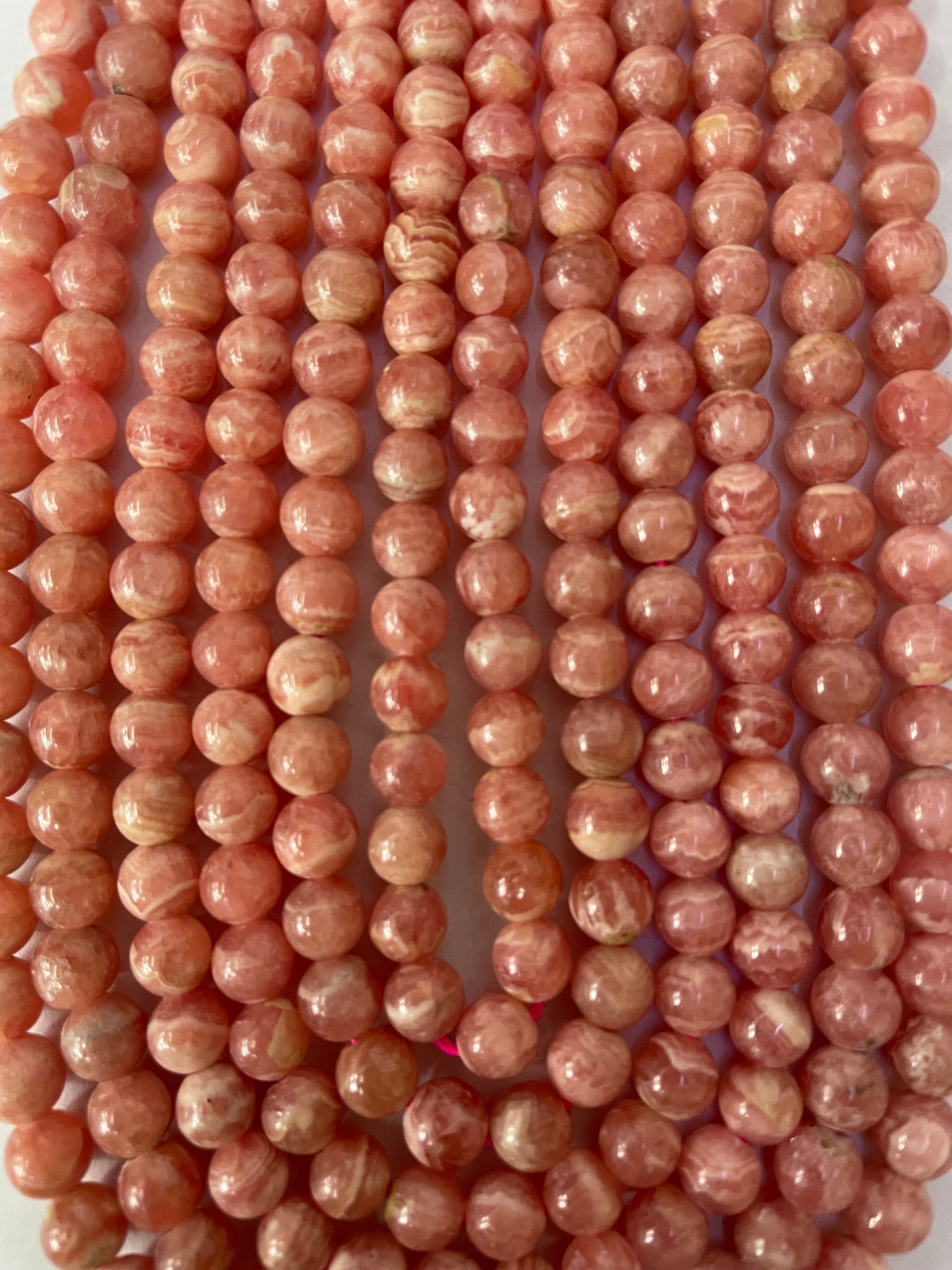 Fil de perles de rhodochrosite de 6 mm