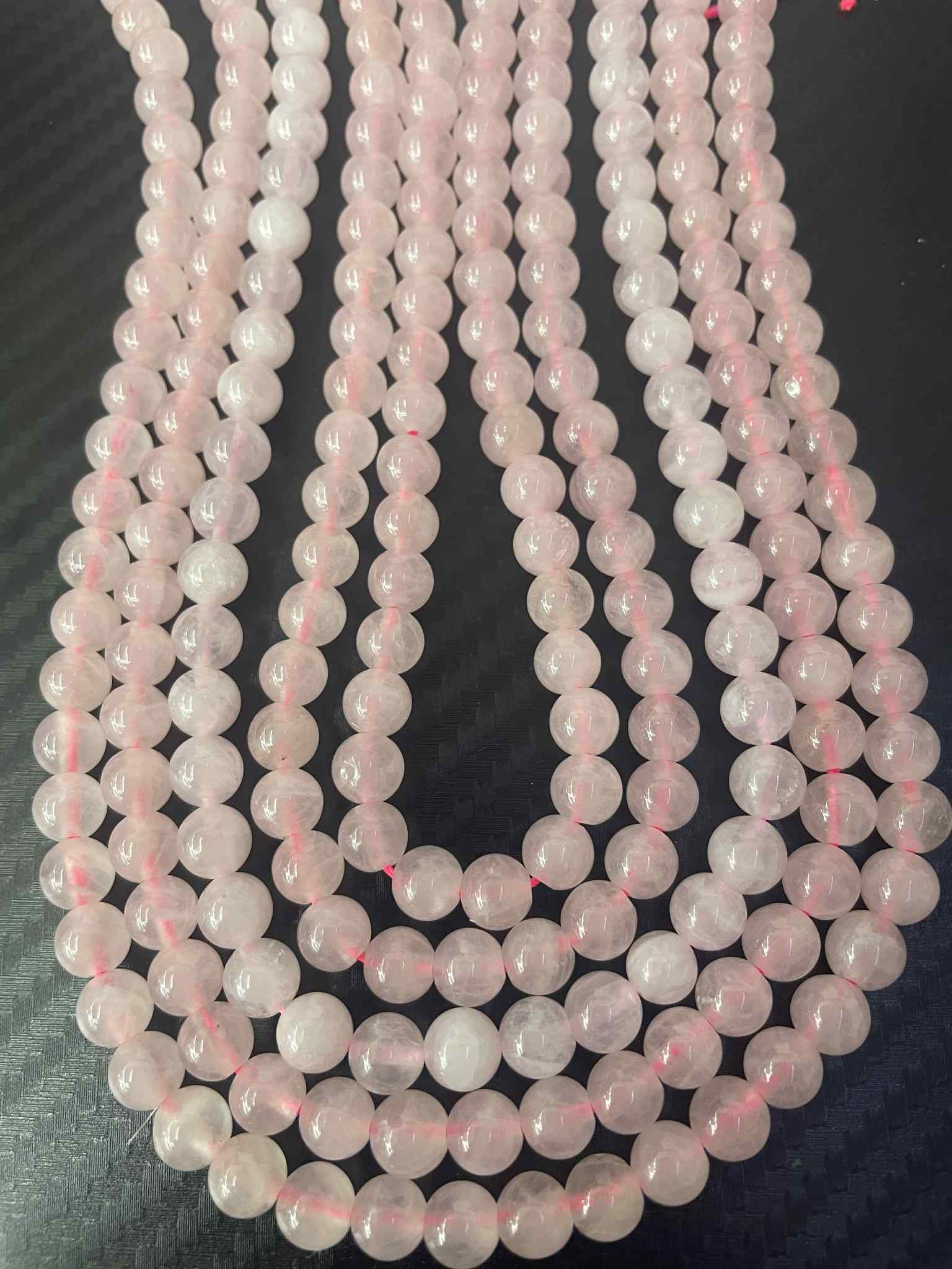 Fil de perles de quartz rose du Madagascar de 6 mm
