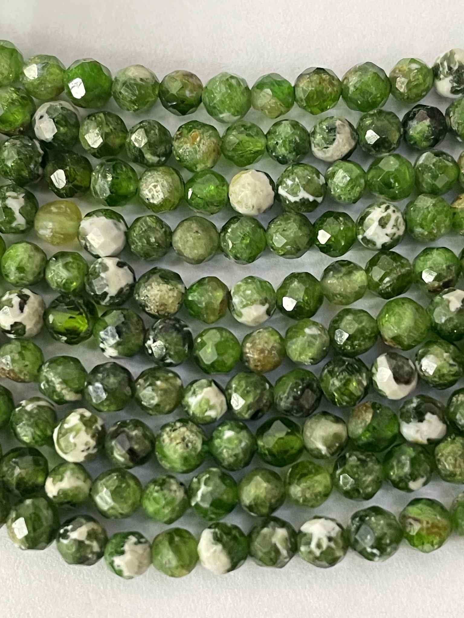 Diopsid mit Quarz ca.3,7mm facettiert