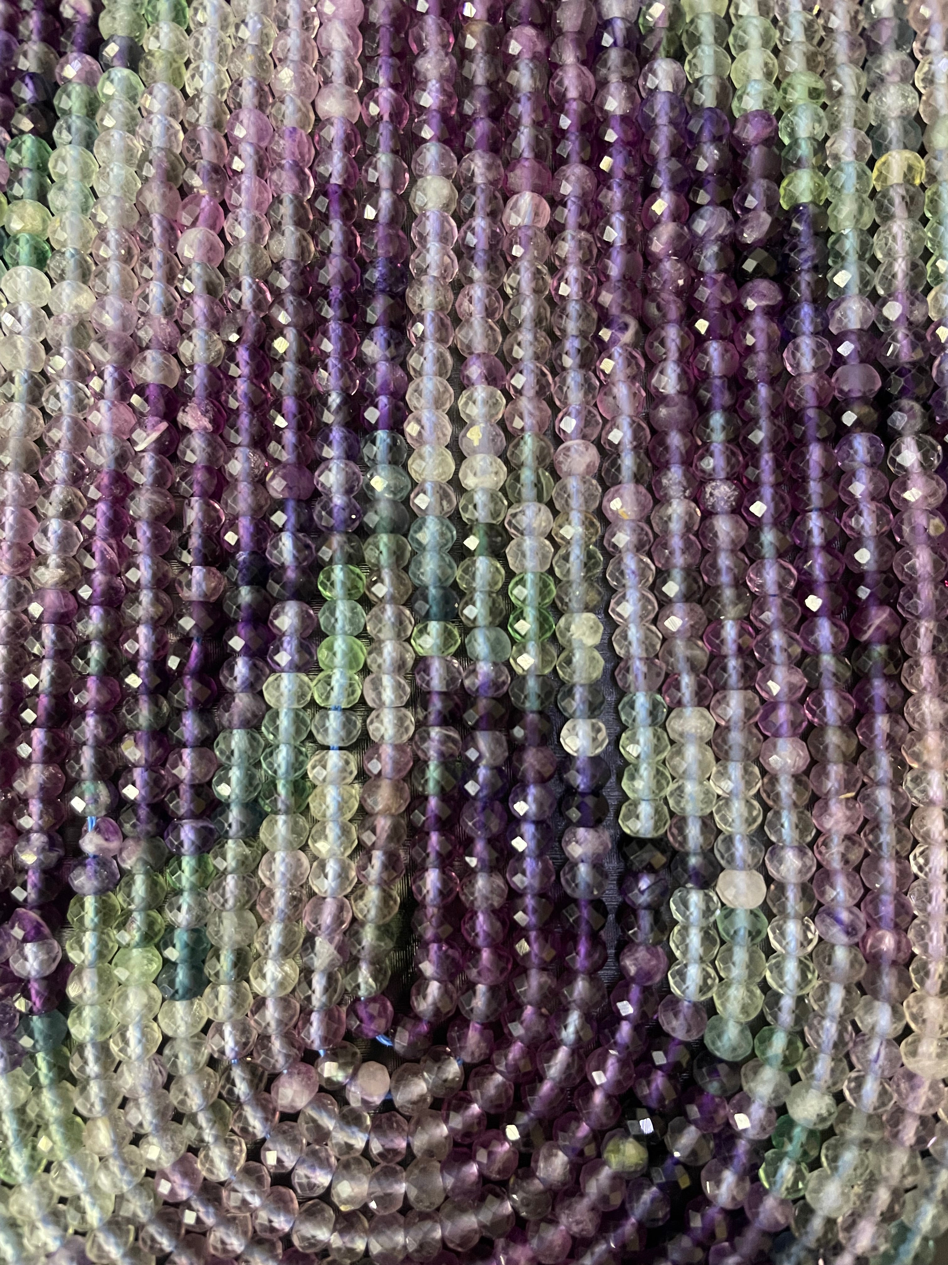 Fluorit facettiert flach ca. 4mm Regenbogen
