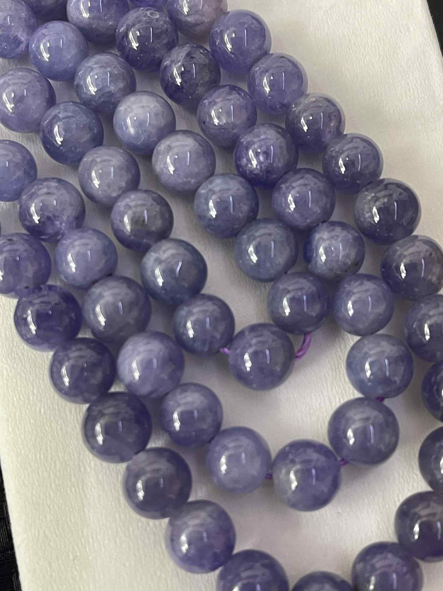 Fil de perles en tanzanite env. 6 mm – qualité rare – origine : Tanzanie TOP