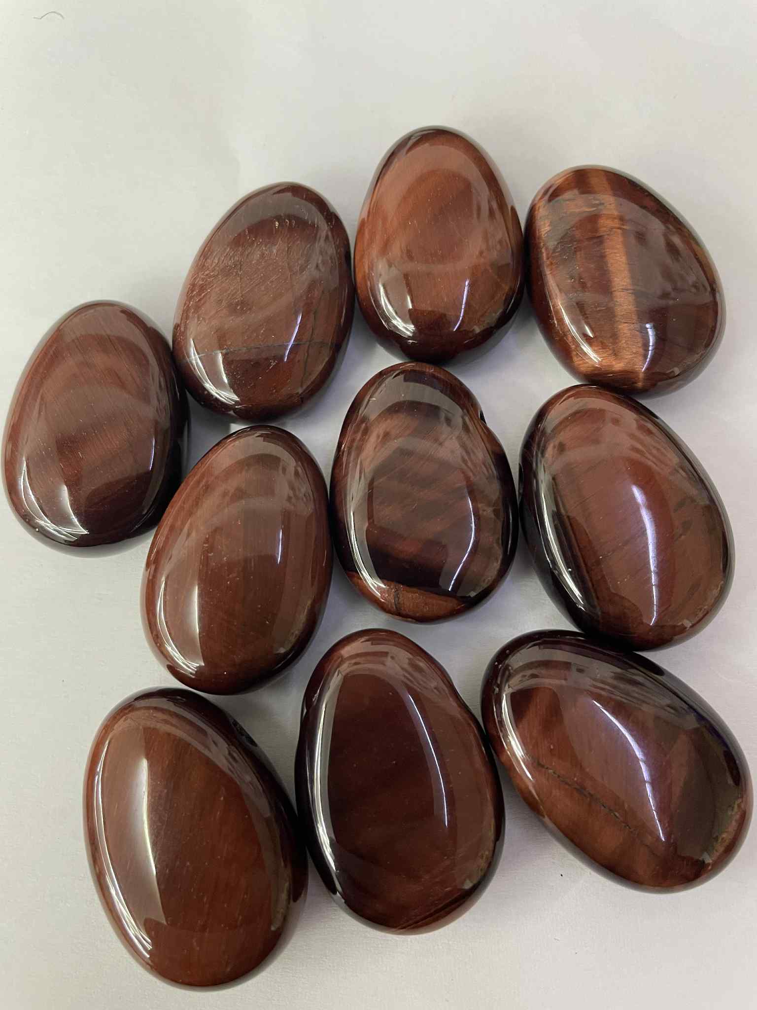 Pendentif perforé en pierre tambourée fer de tigré