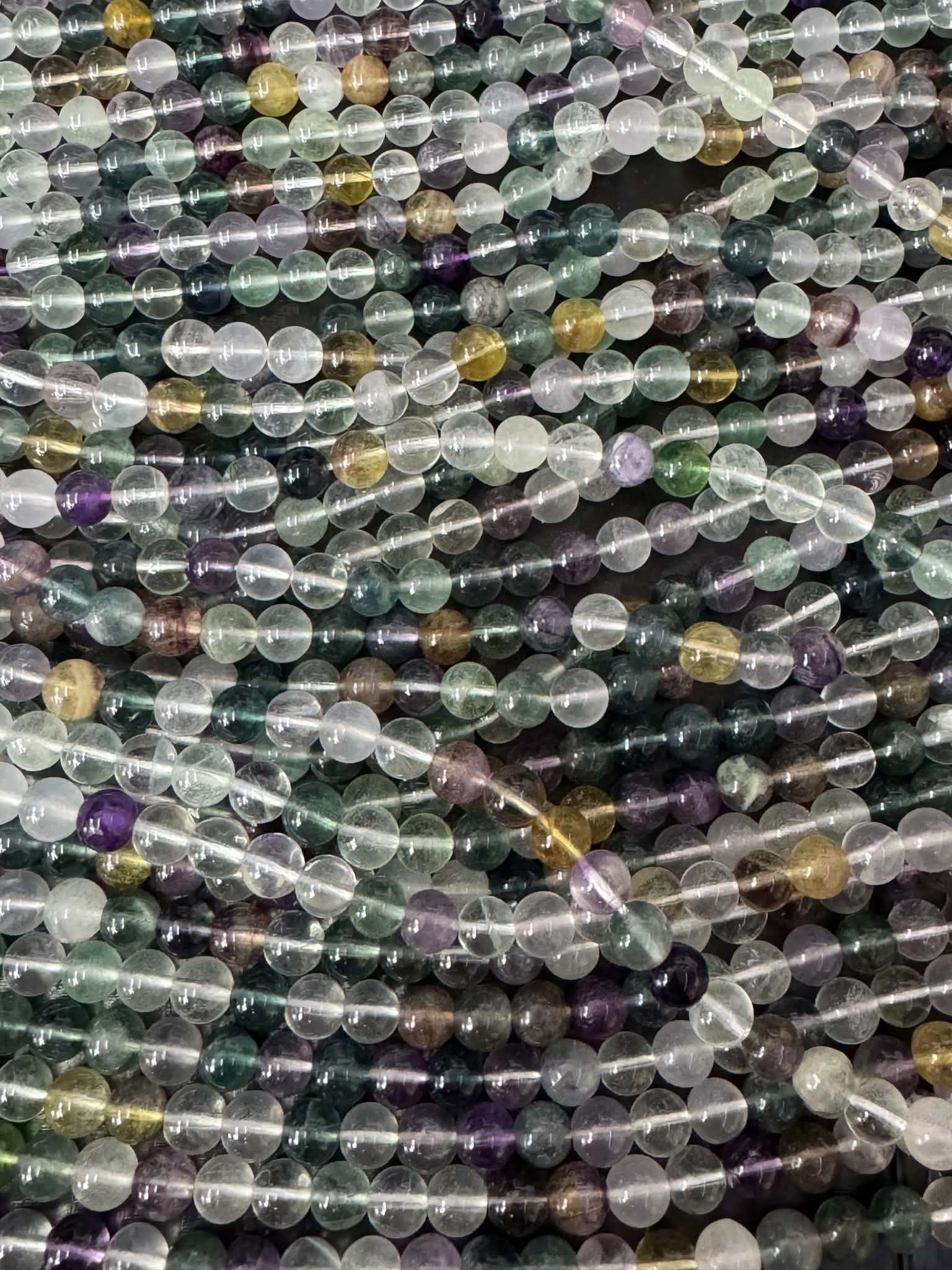Fluorite claire, fil de perles rondes env. 6,5 mm
