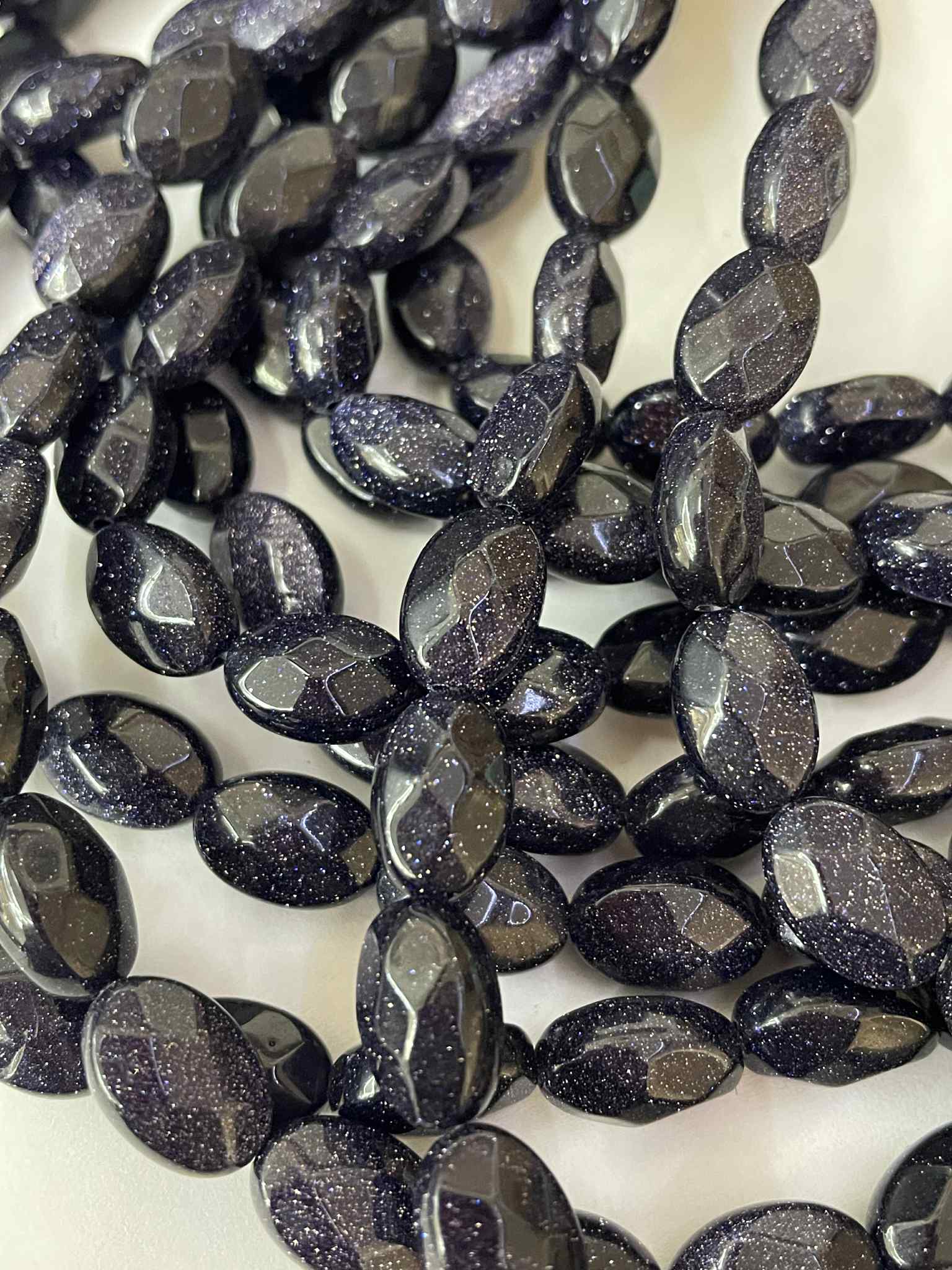 Goldfluss blau Strang Oval facettiert ca. 12 x 9 mm